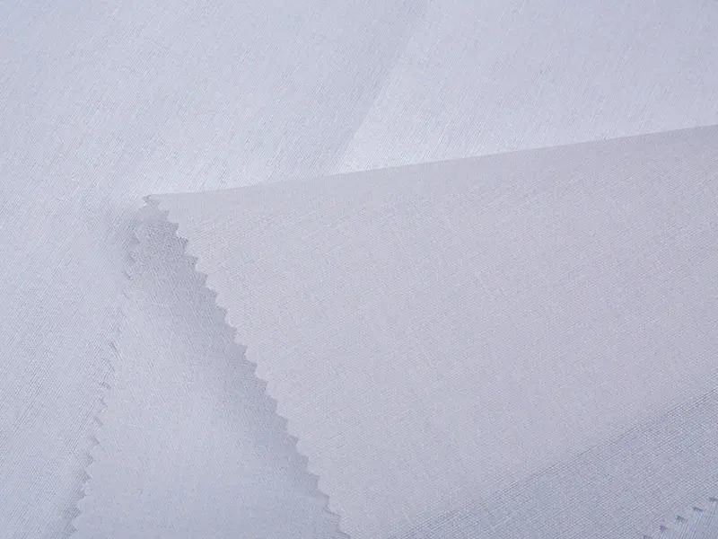 Quid T / C Fusibilem Shirt Interlining significantly amplio consolationem tunicas?